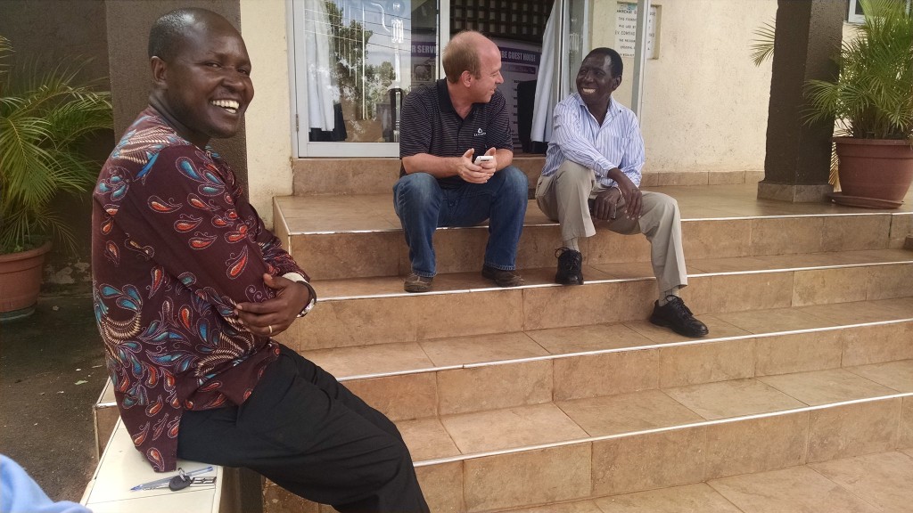 8:7's Eric Casteel with members of the Anglican Church of Uganda. 